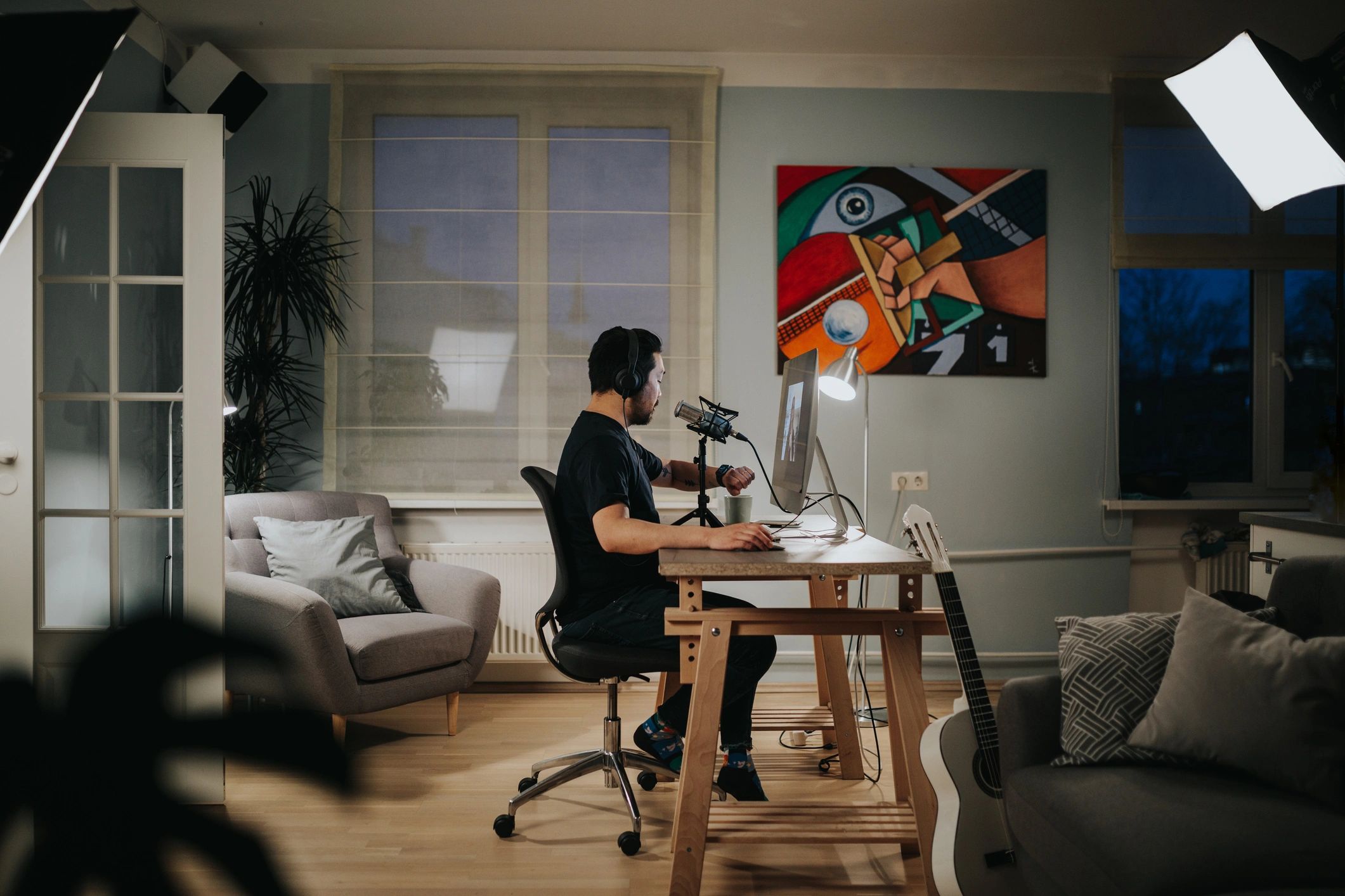 Home technology specialist setting up equipment in a home office