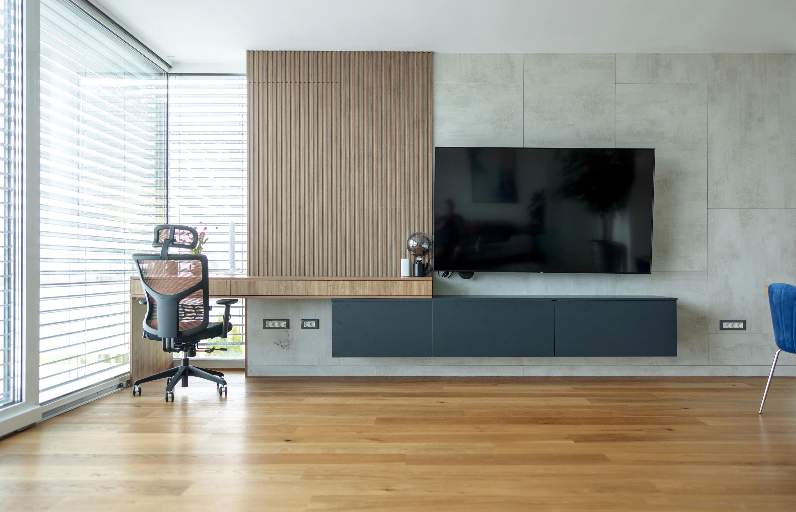 Home entertainment area with seating and display