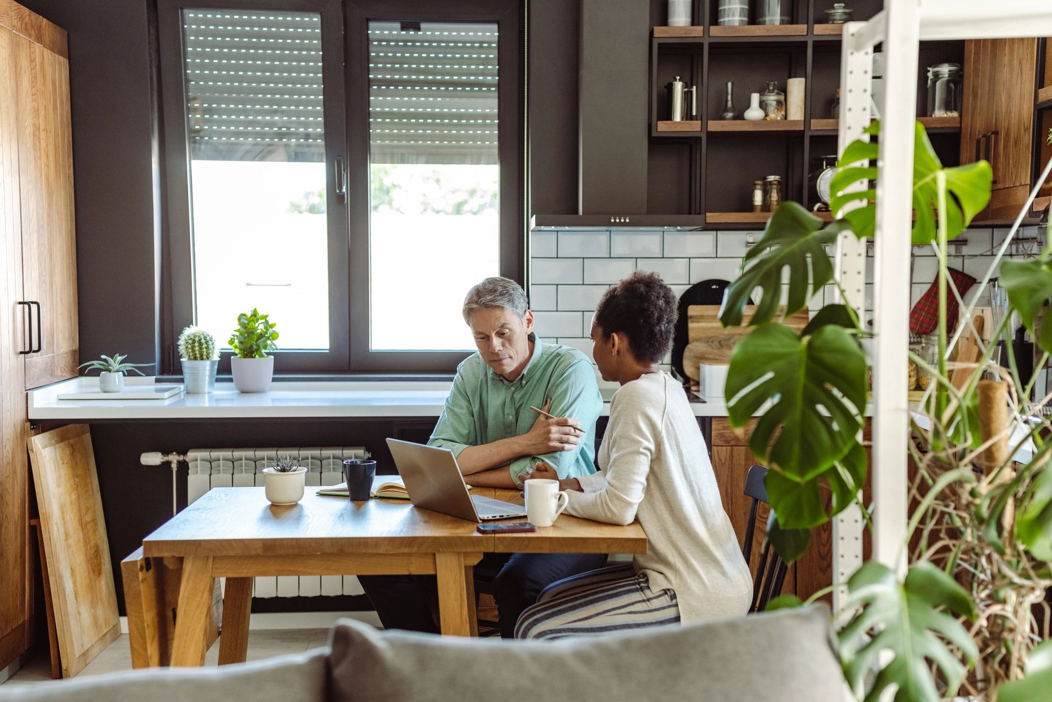 Professional providing in-home support to a couple